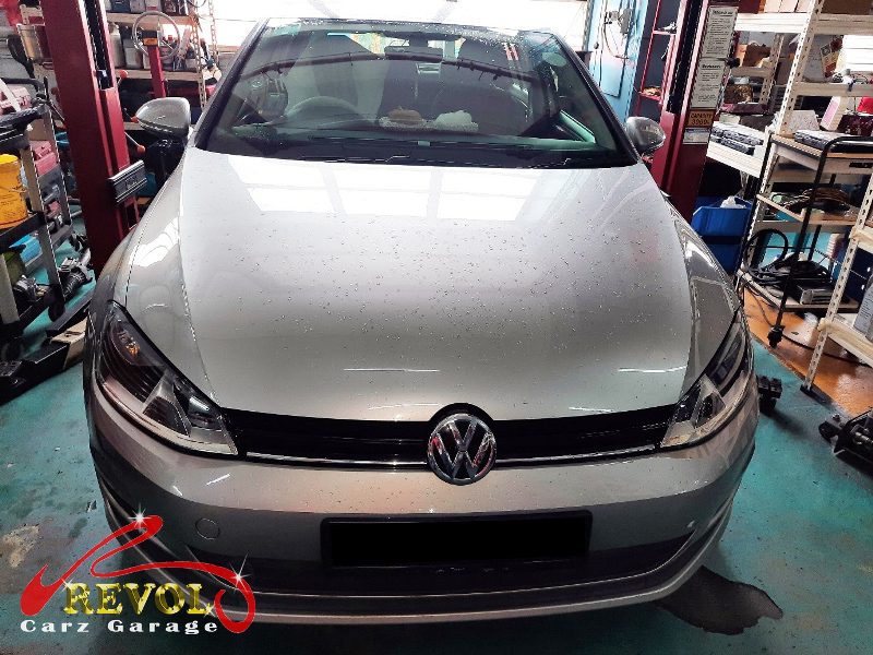 Volkswagen Golf parked at the workshop, in for a brake overhaul.