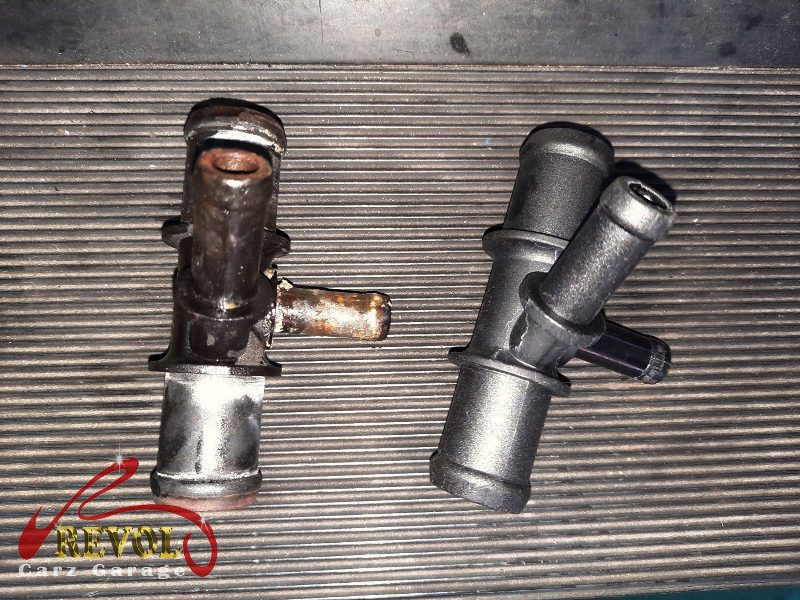 The new fuel filter and hoses installed and the system primed.