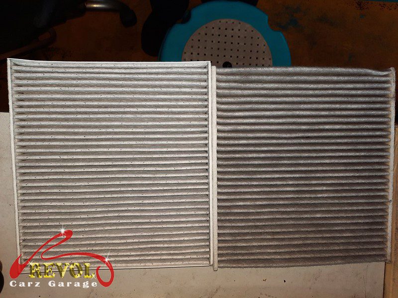 The old air and cabin filters removed alongside the new ones.