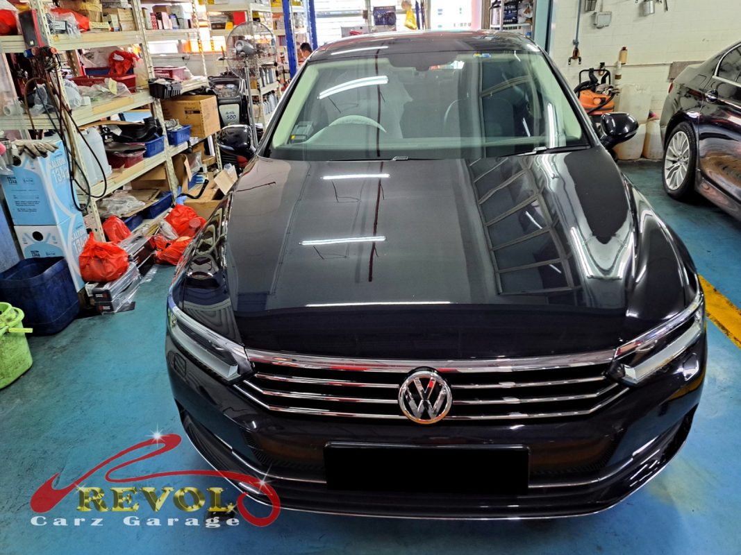 Volkswagen Passat parked at the workshop, in for an oil leak diagnosis.