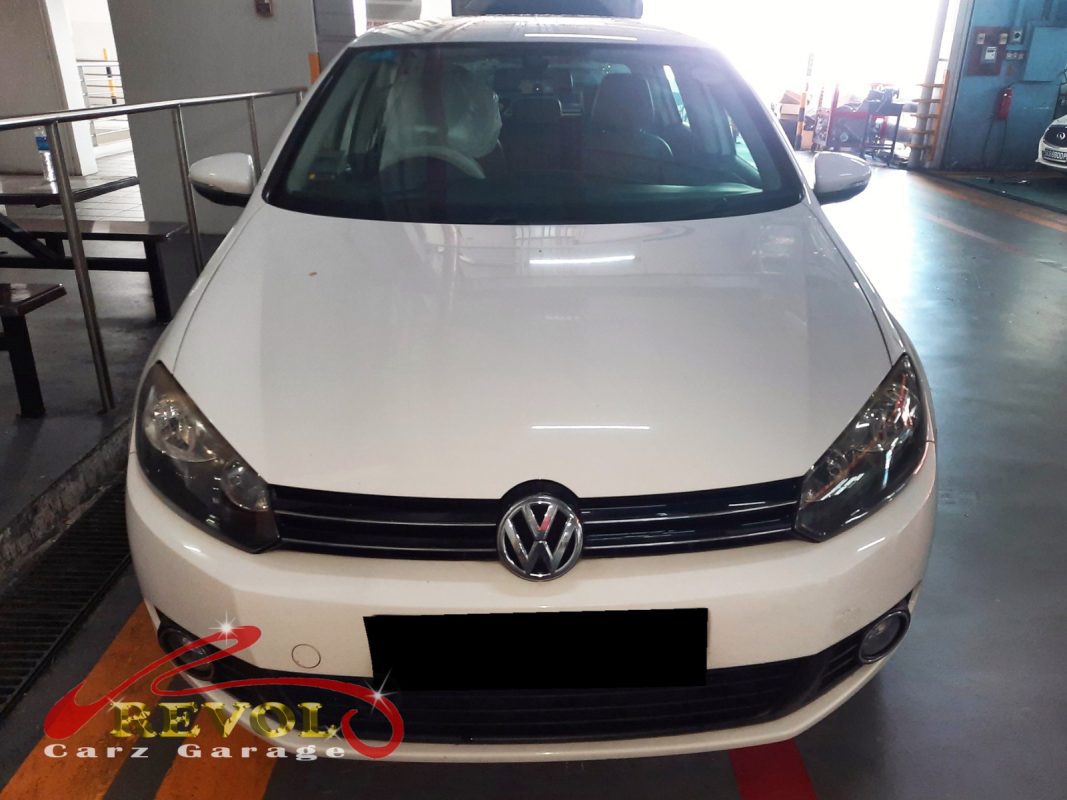 Volkswagen Golf parked at the workshop, in for front suspension inspection.
