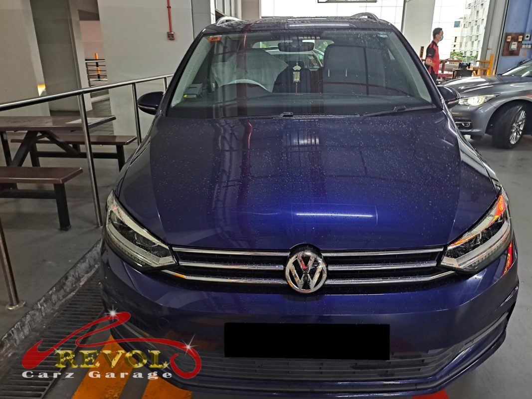 Volkswagen Touran parked at the workshop, in for a coolant leak diagnosis.