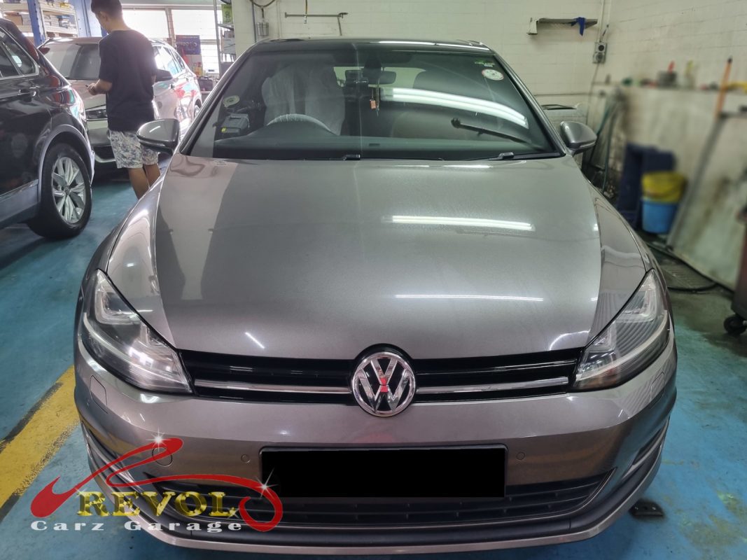 Volkswagen Golf parked at the workshop, in for aircon compressor inspection.