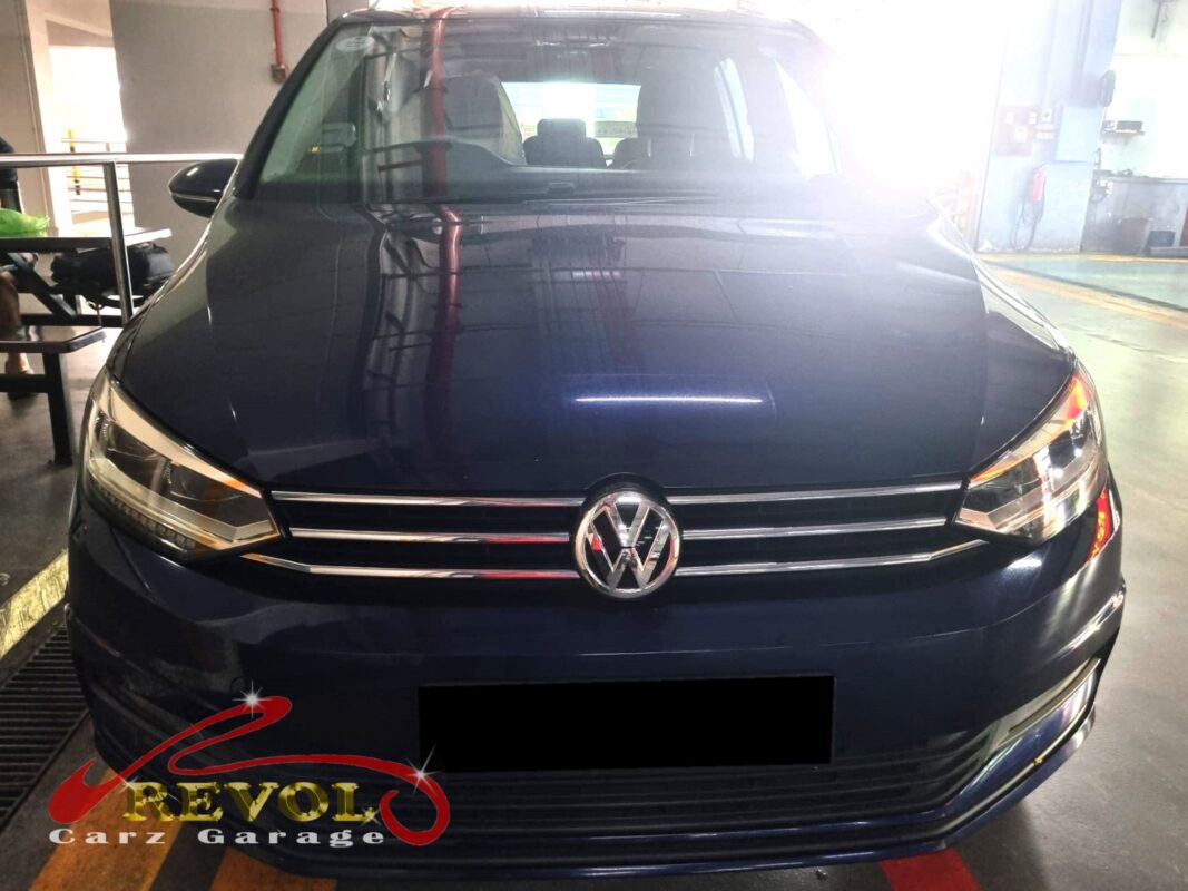 Volkswagen Touran parked at the workshop, in for misfire diagnosis.