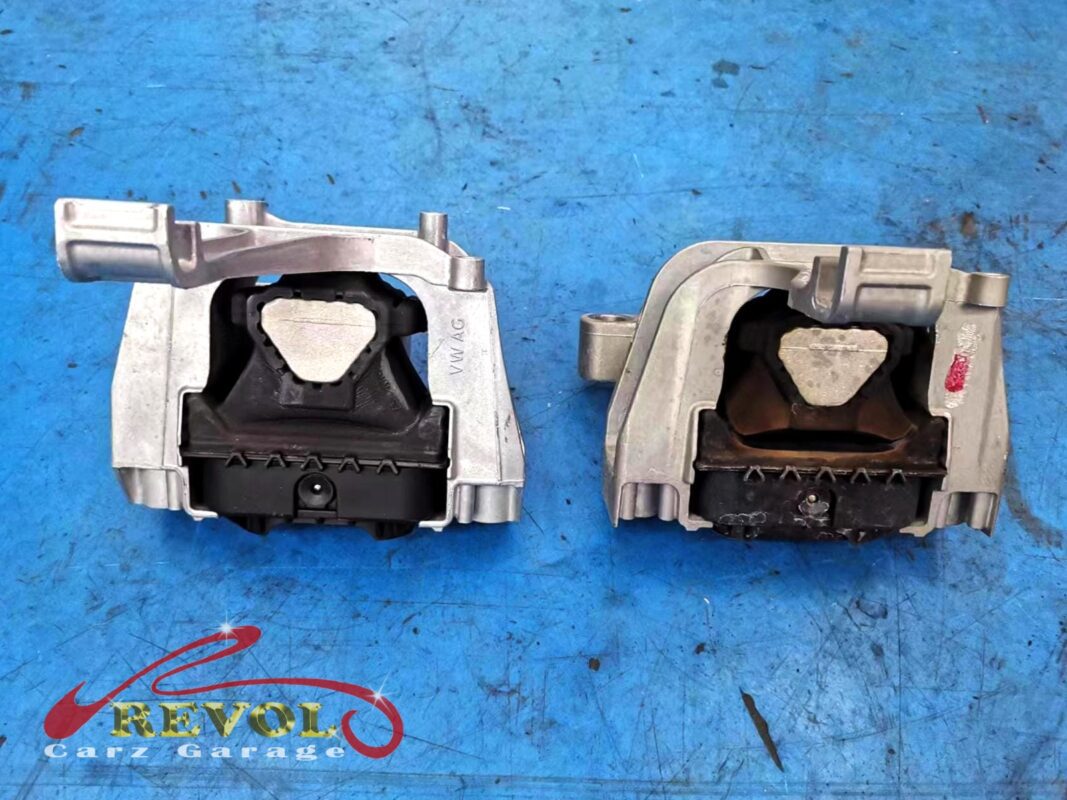 The gearbox mount removed showing the play under load.