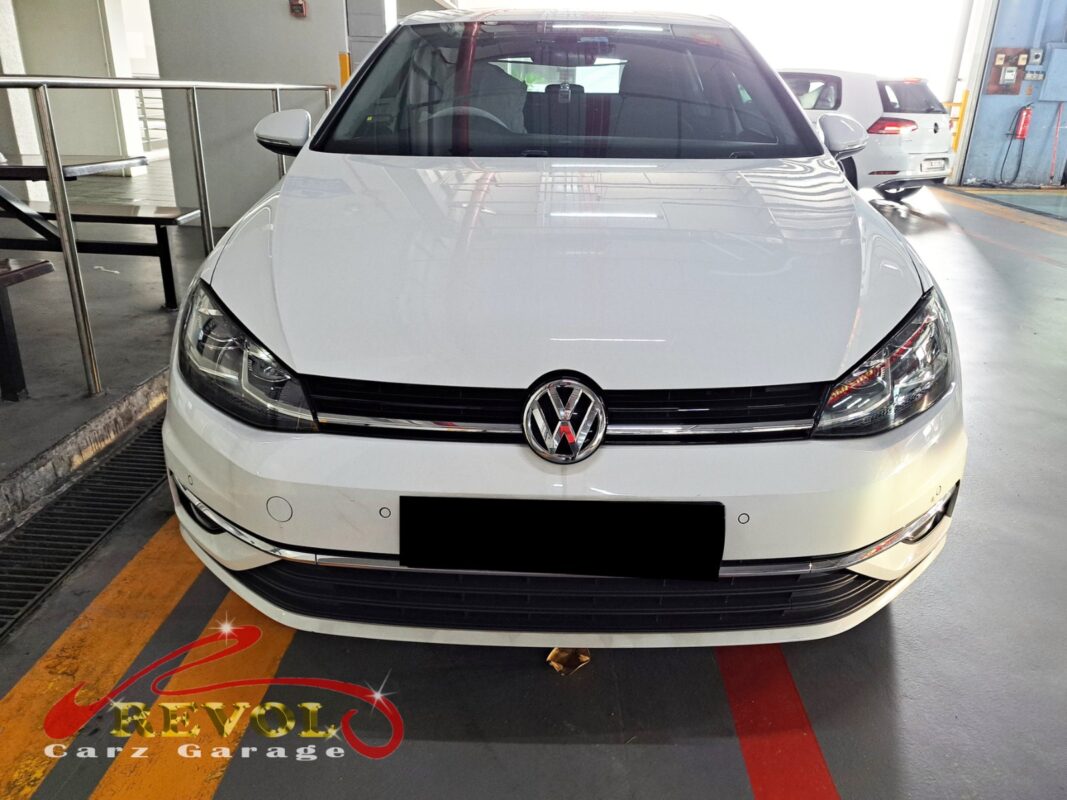 Volkswagen Golf parked at the workshop for routine servicing.