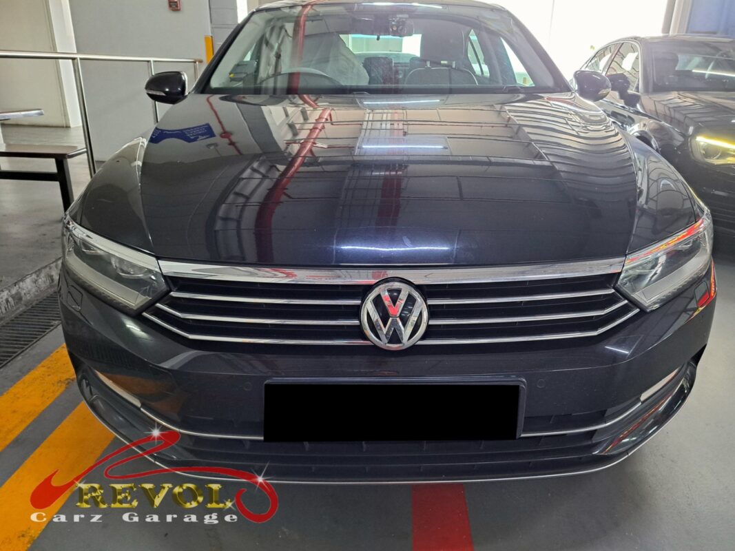 Volkswagen Passat parked at the workshop for servicing.