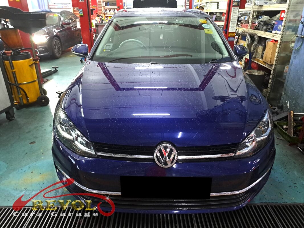 Volkswagen Golf parked at the workshop for routine servicing.