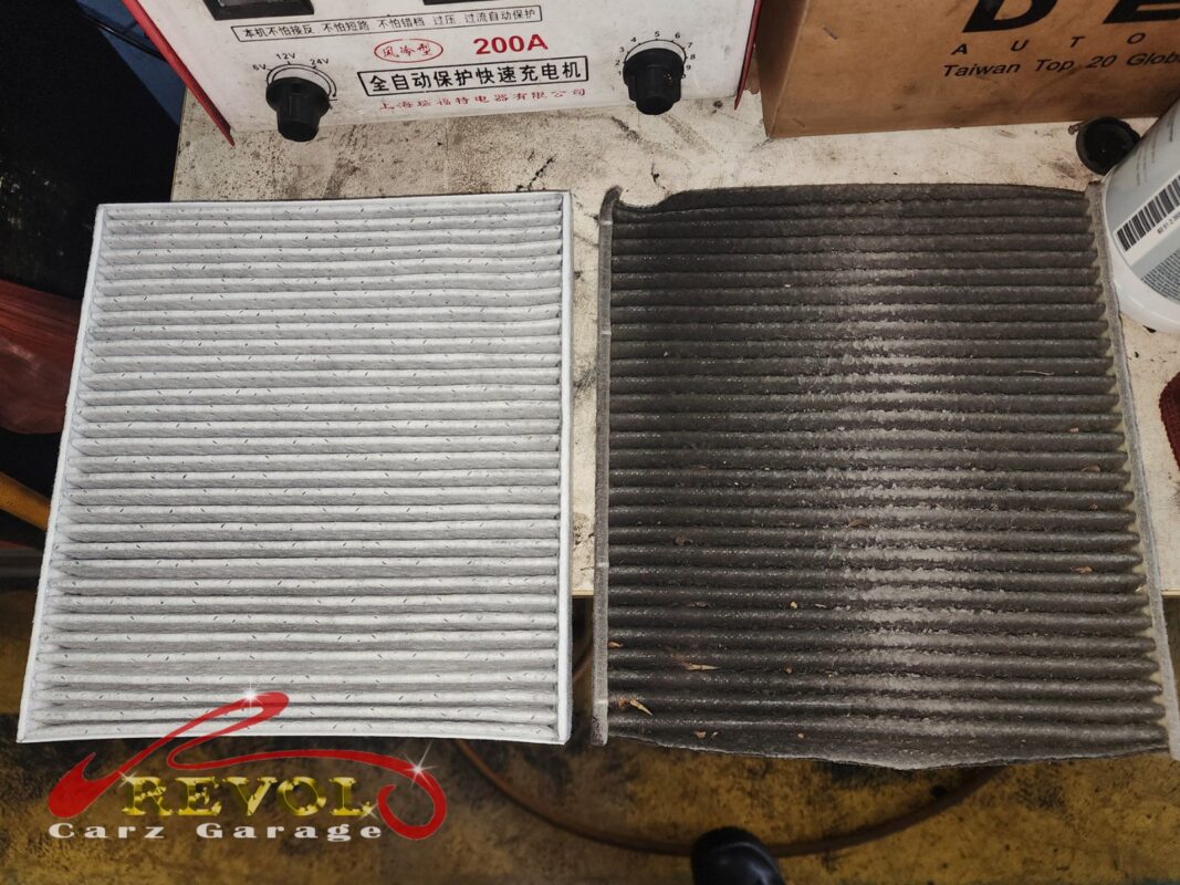 The old air filter beside the new VAG-spec replacement.