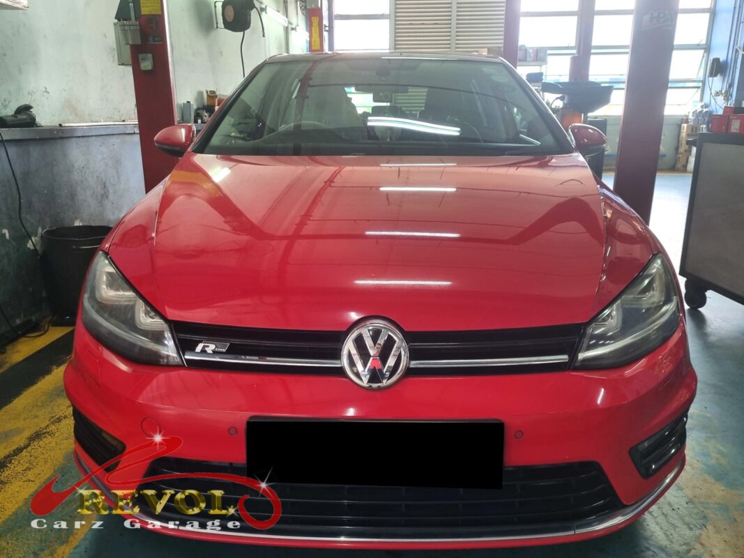Volkswagen Golf parked at the workshop, in for engine mount inspection.
