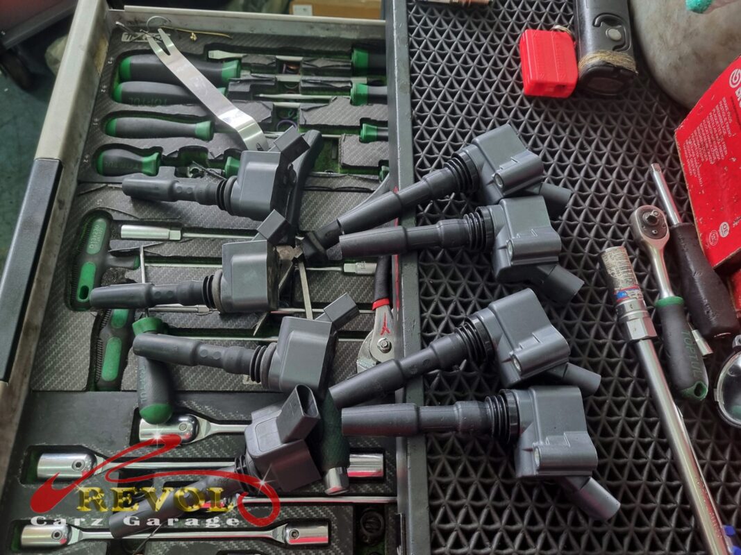 The faulty ignition coil removed from the engine.