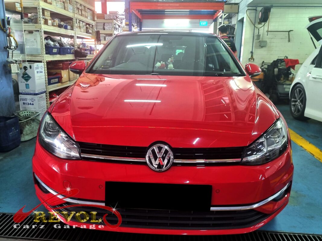 Volkswagen Golf parked at the workshop for servicing.