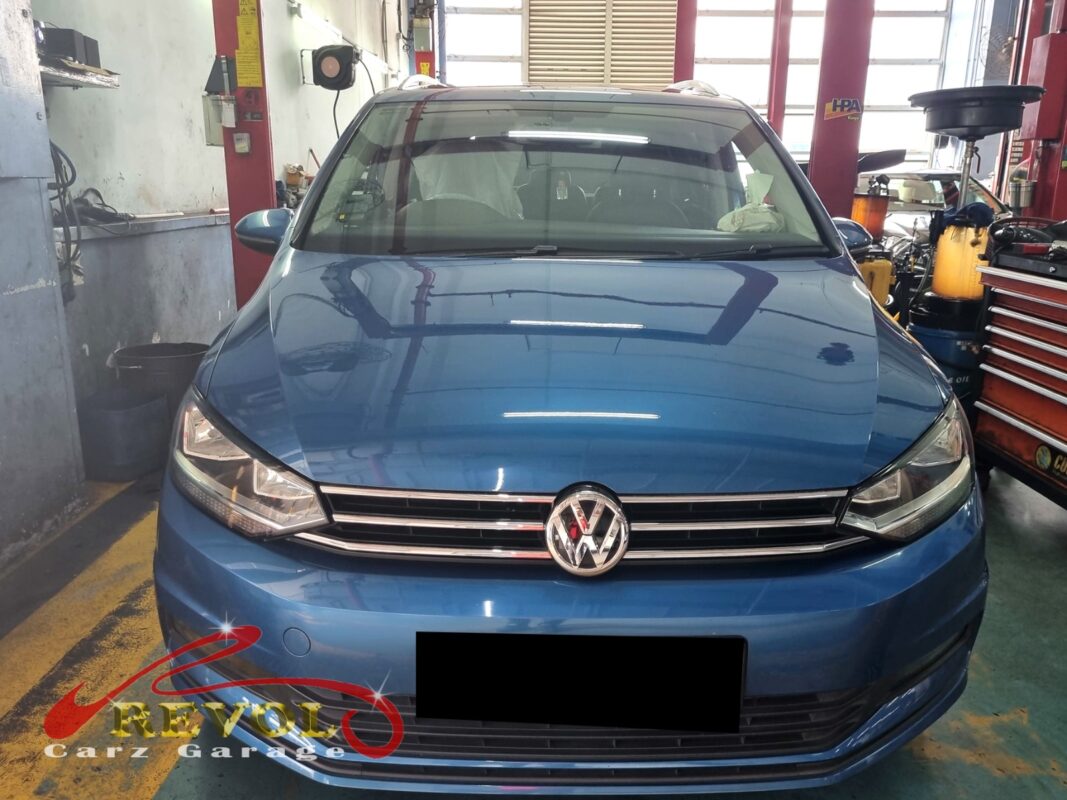 Volkswagen Touran parked at the workshop, in for a spark plug change.