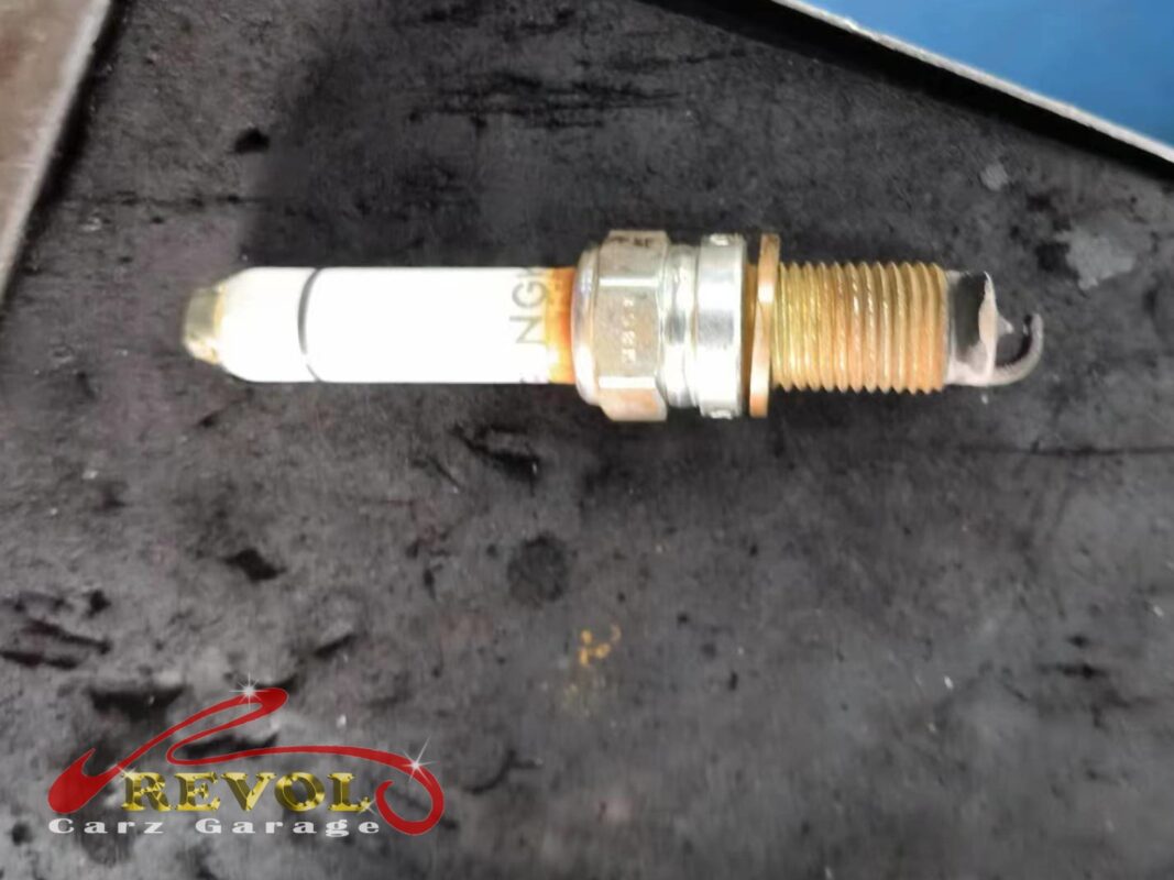 The new VW-spec spark plugs ready to fit.