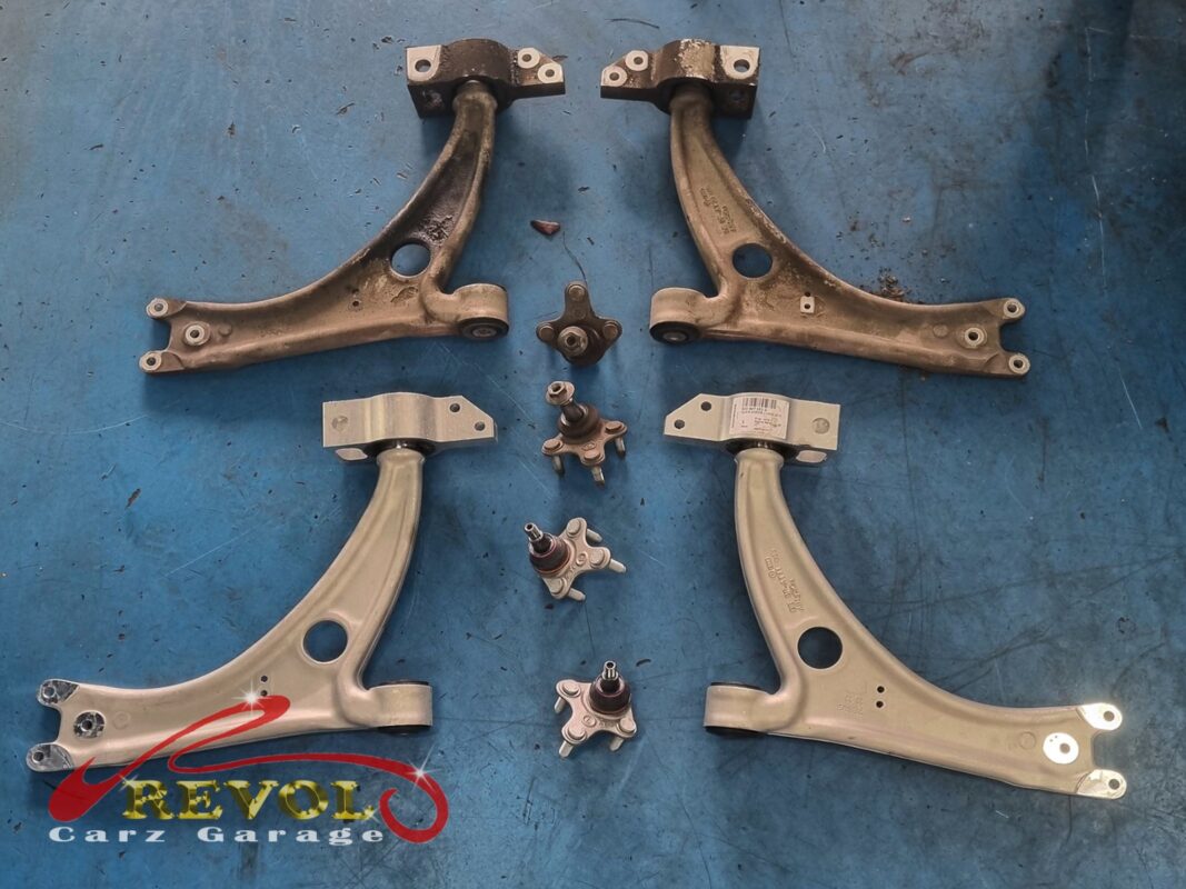 The new VW-spec lower arms with fresh bushes and ball joints ready to fit.