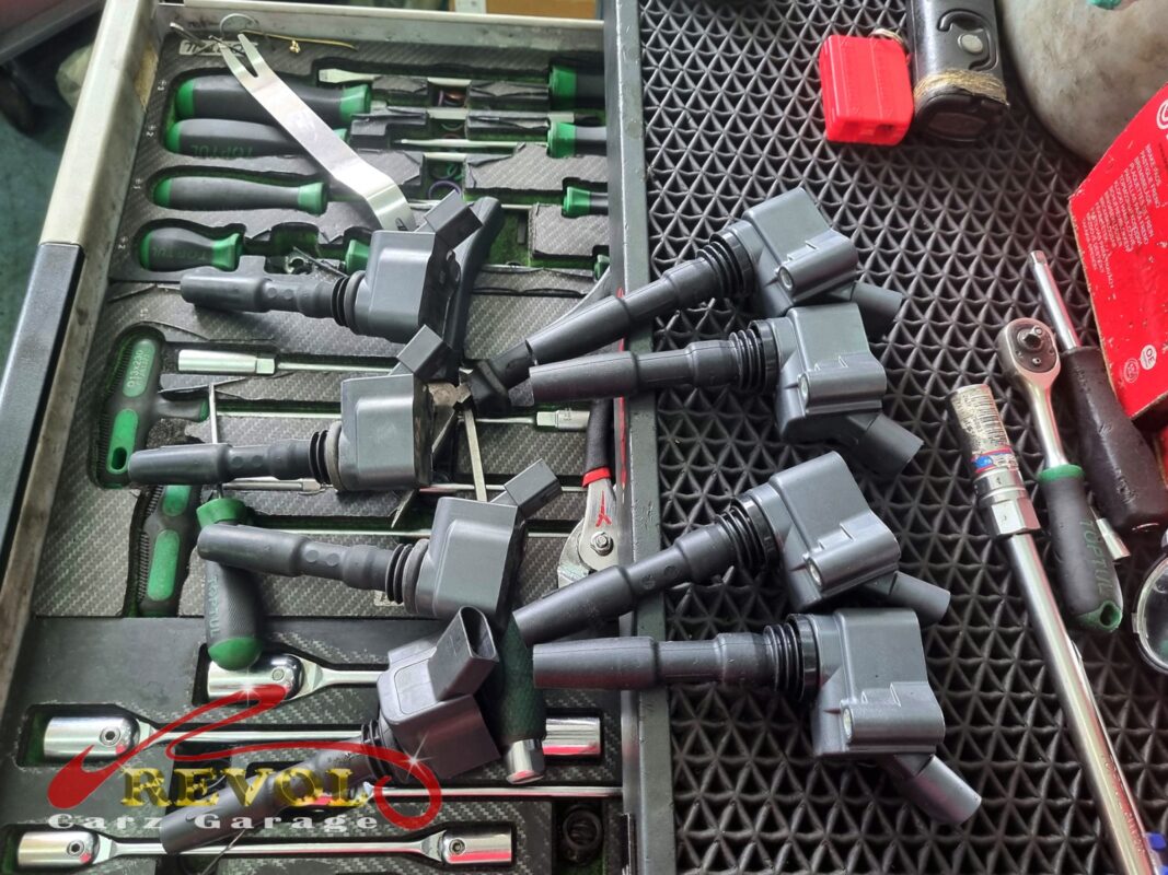 The new VW-spec spark plugs and ignition coils ready to fit.