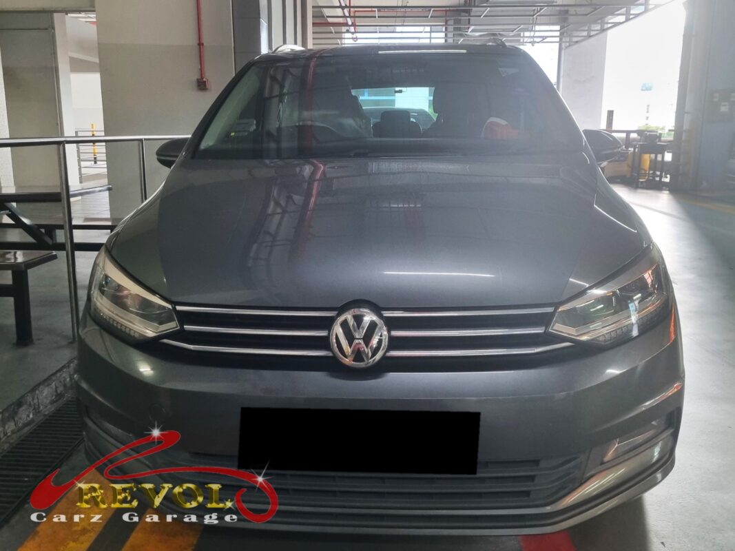Volkswagen Touran parked at the workshop, in for front subframe inspection.