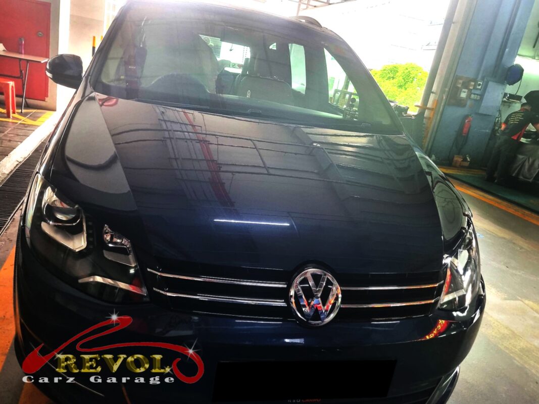 Volkswagen Sharan on the lift for oil sump replacement.