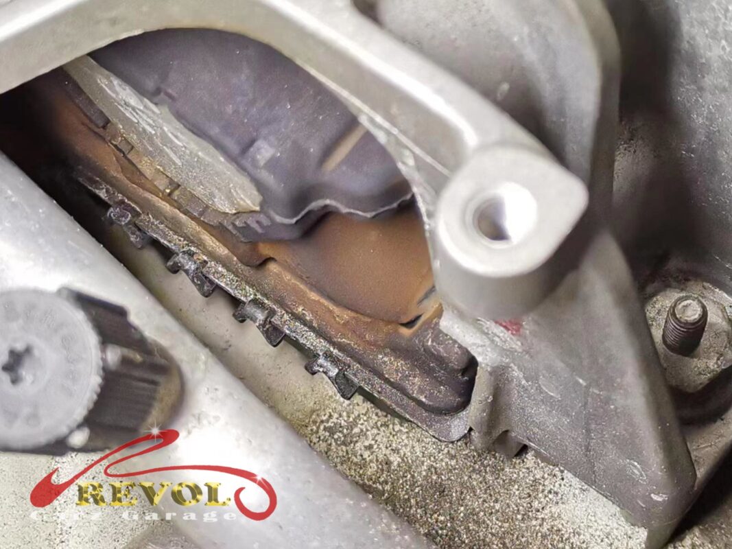 The old engine mount in the bay, the rubber torn and hydraulic fluid leaked out.