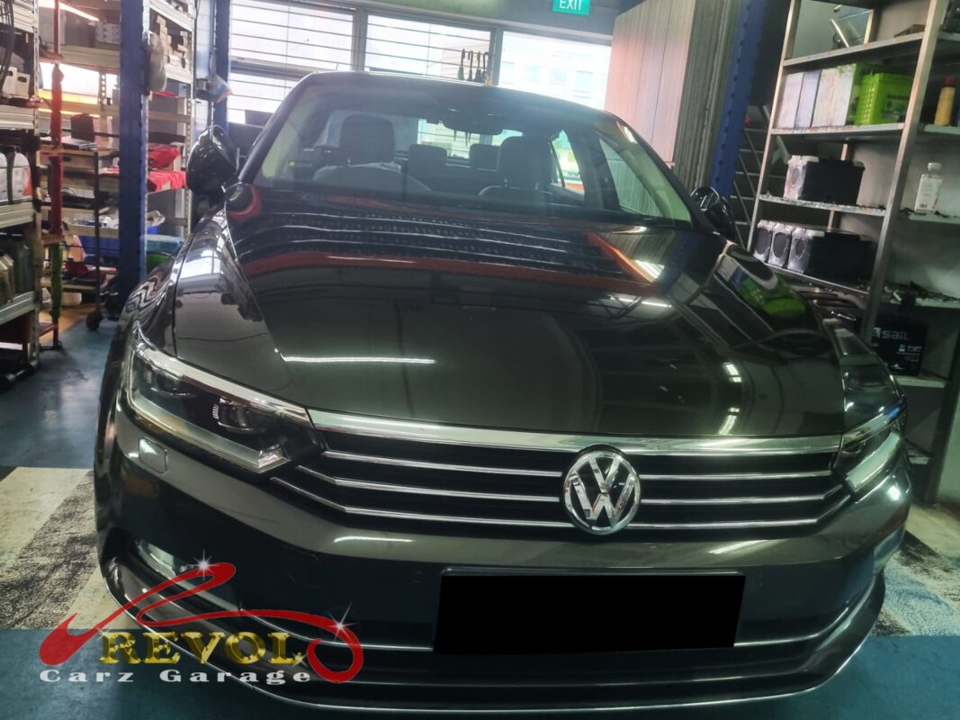 Volkswagen Passat on the lift for oil sump and level sensor work.