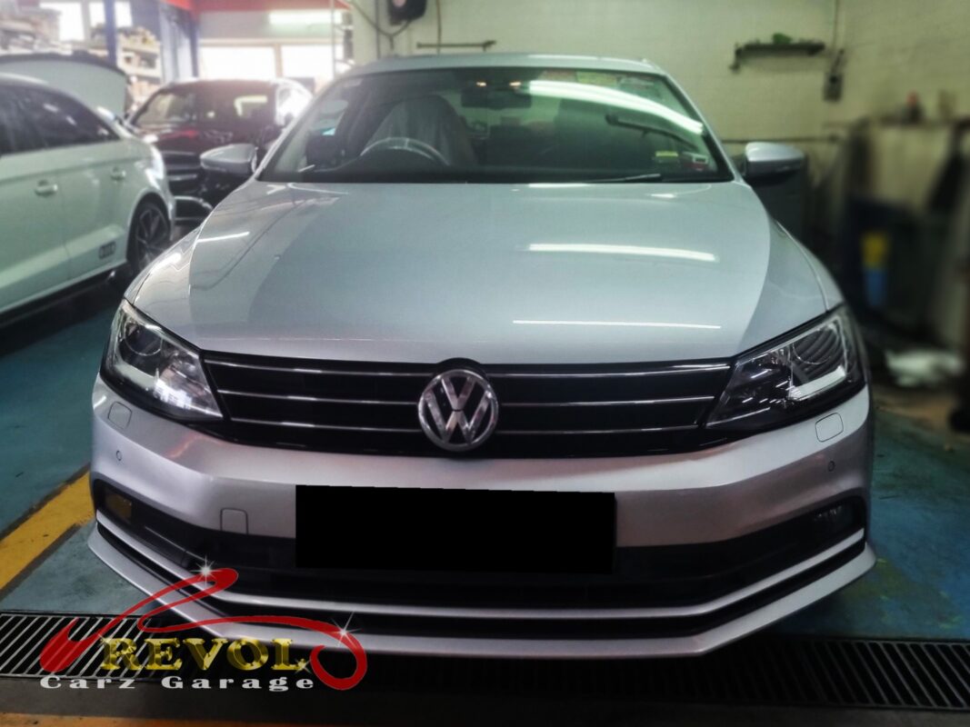 Volkswagen Jetta on the lift for lower control arm replacement.