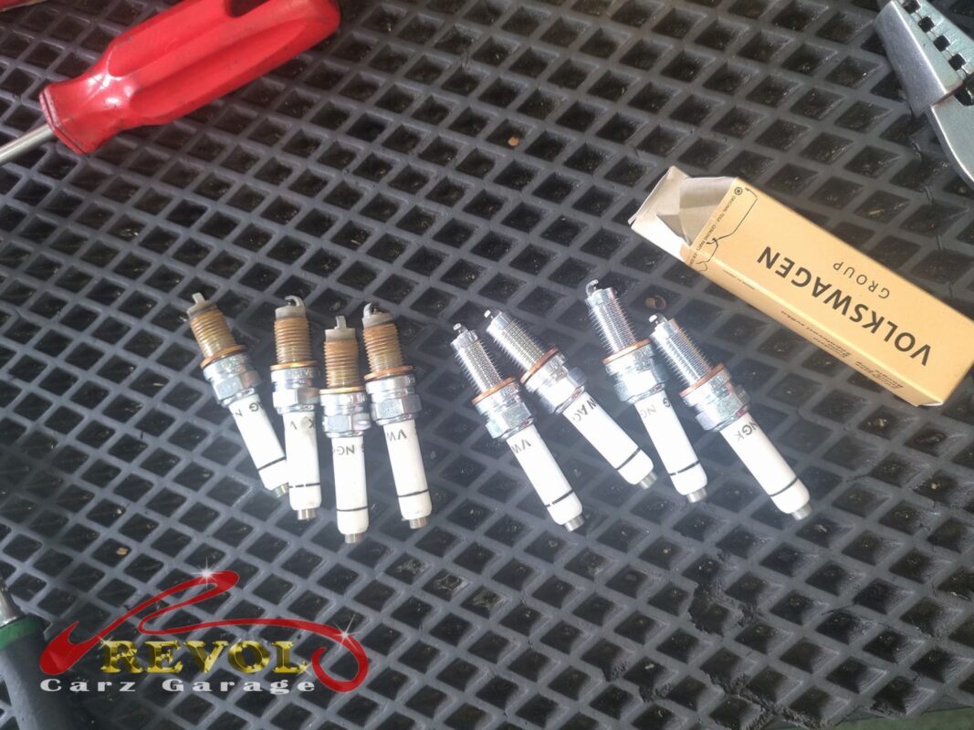 The four old plugs (left) beside the four new VAG-spec replacements (right), genuine VW set.