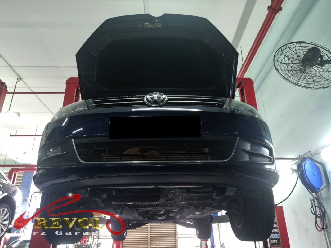 The Sharan up on the two-post lift, bonnet open, in for the coolant leak.