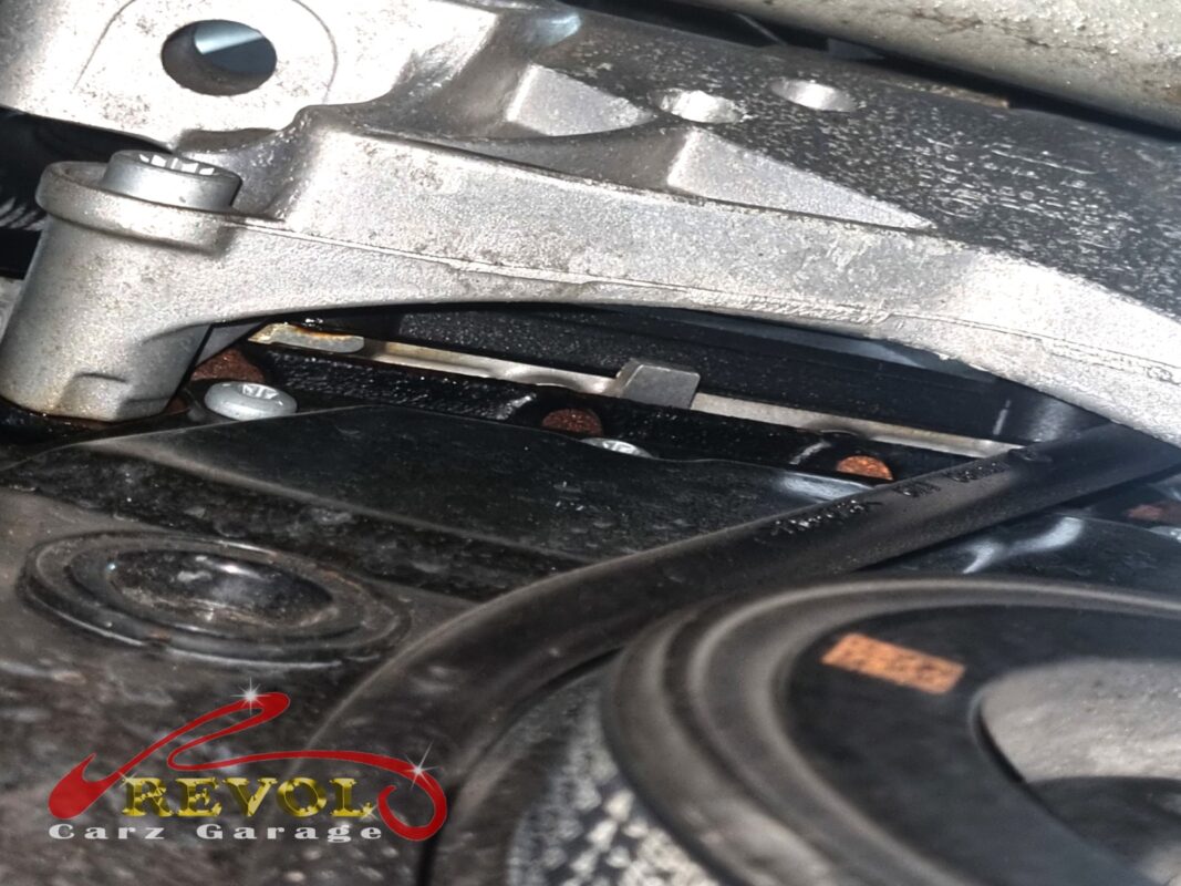 The timing cover area on the front of the engine, before the cover came off.