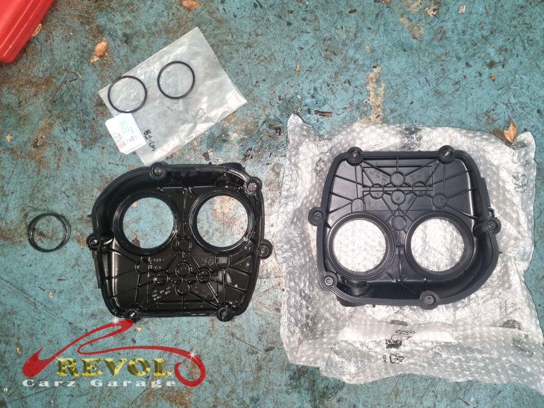 The timing chain and sprockets exposed, the area cleaned up before the new cover went on.