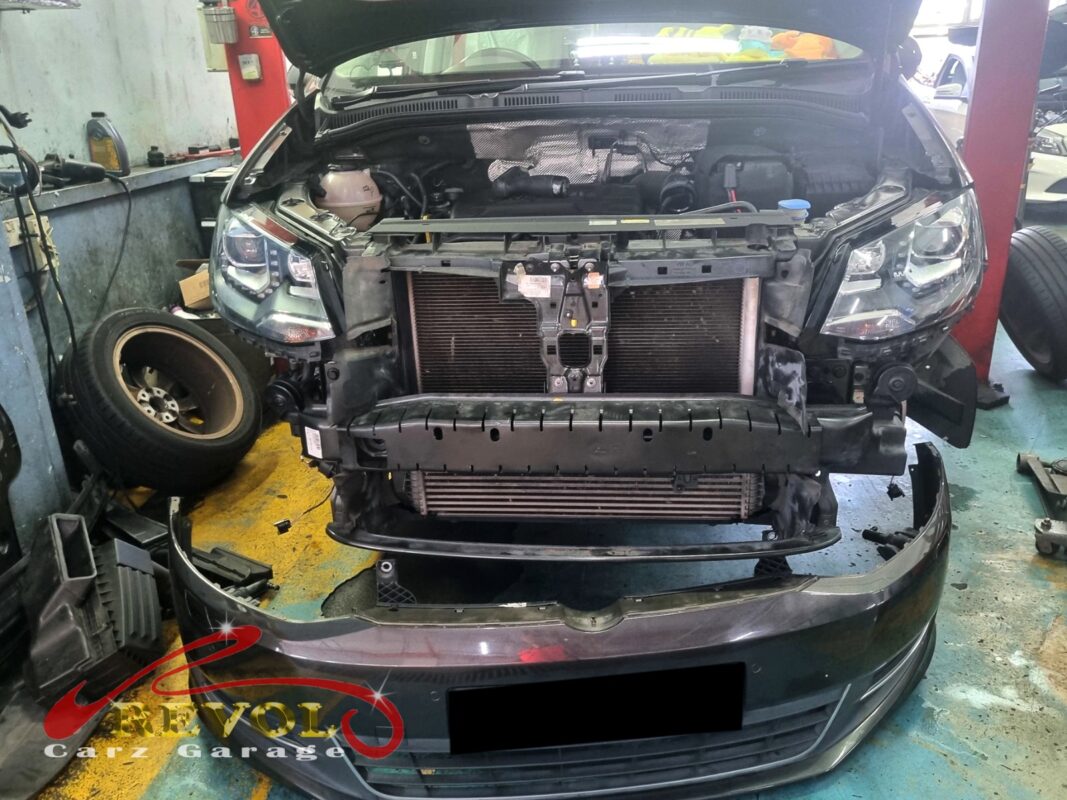 The front bumper off and the radiator support exposed to get the radiator out.