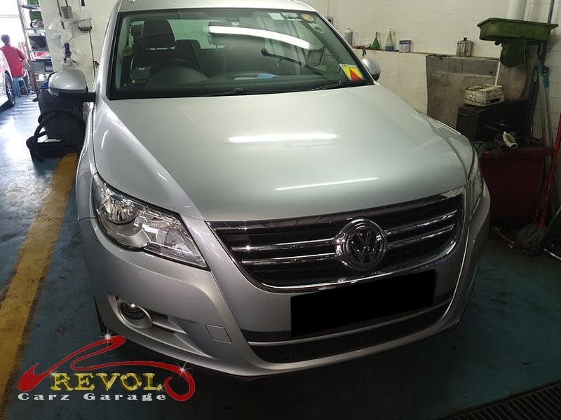 Volkswagen parked at the workshop for servicing.