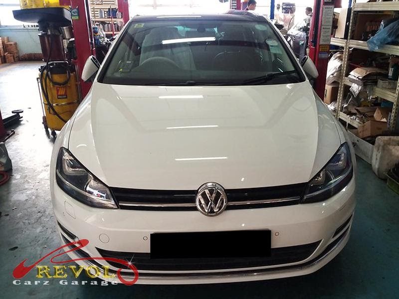 Volkswagen Golf parked at the workshop, in for engine mount inspection.