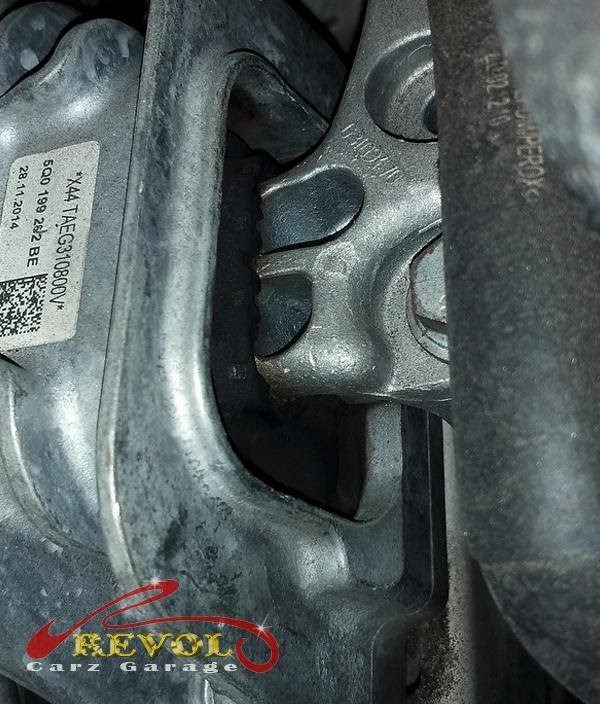 The gearbox mount removed showing the play under load.