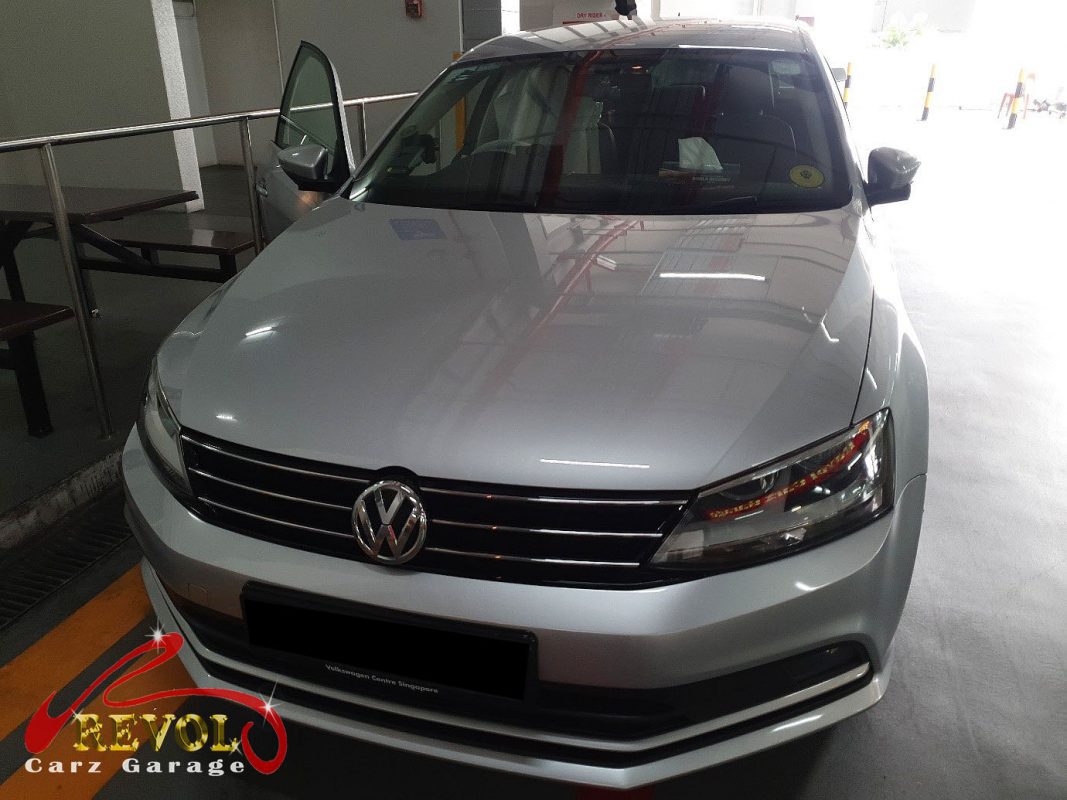Volkswagen Jetta parked at the workshop for maintenance servicing.
