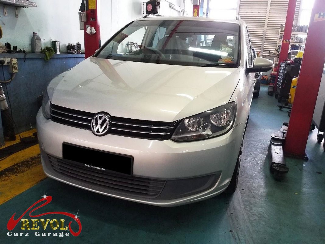 Volkswagen Touran parked at the workshop, in for a coolant leak diagnosis.