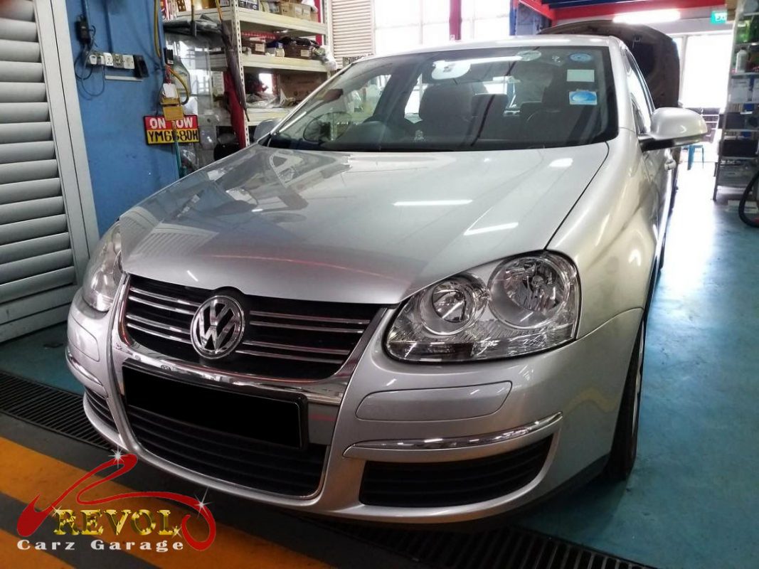 Volkswagen Jetta parked at the workshop for scheduled servicing.