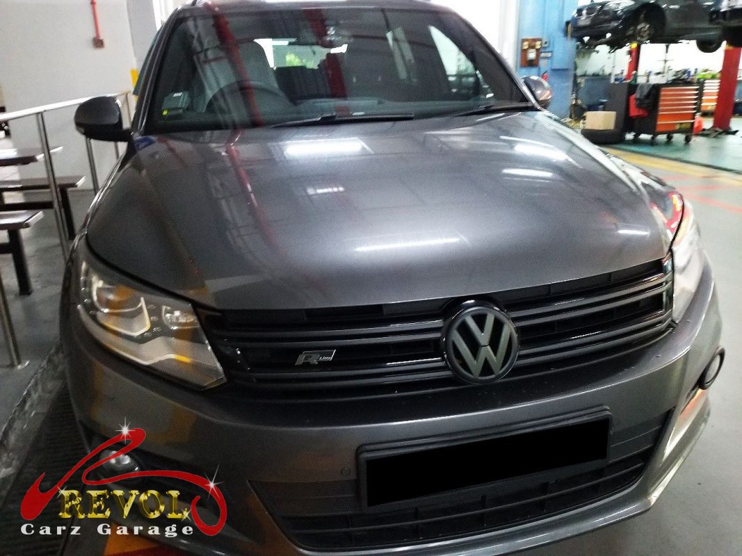 Volkswagen Tiguan parked at the workshop, in for a squeal and overheating diagnosis.