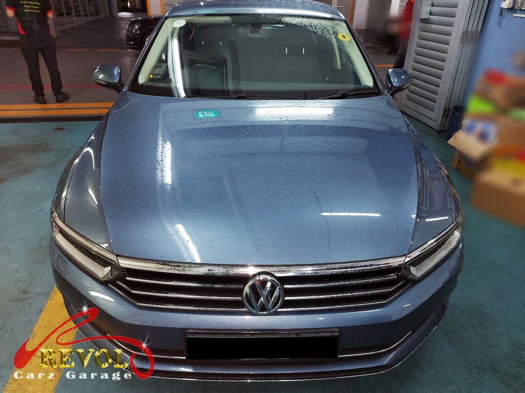 Volkswagen Passat parked at the workshop, in for front brake inspection.