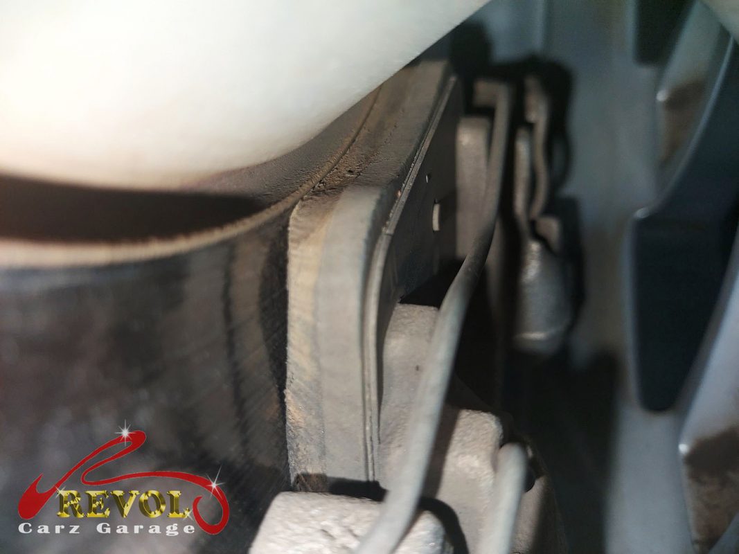 The old front discs removed alongside the new set.