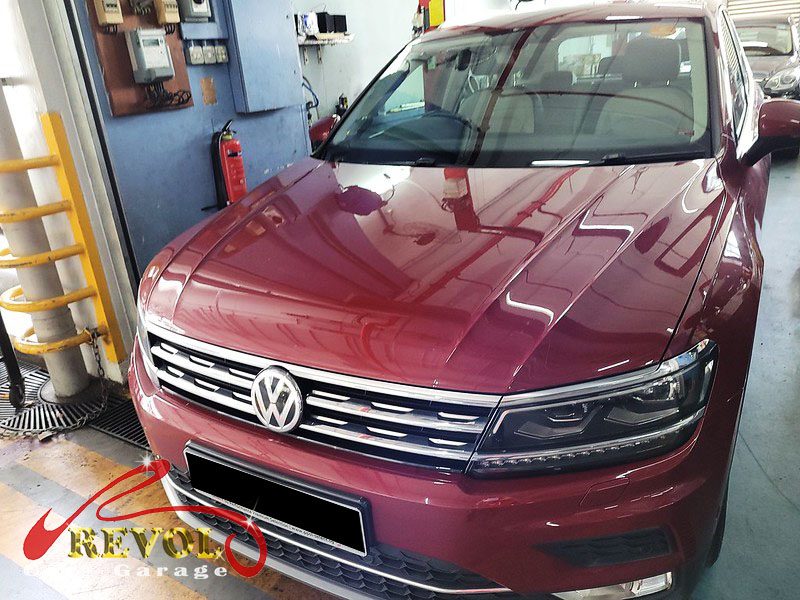 Volkswagen Tiguan parked at the workshop for maintenance servicing.