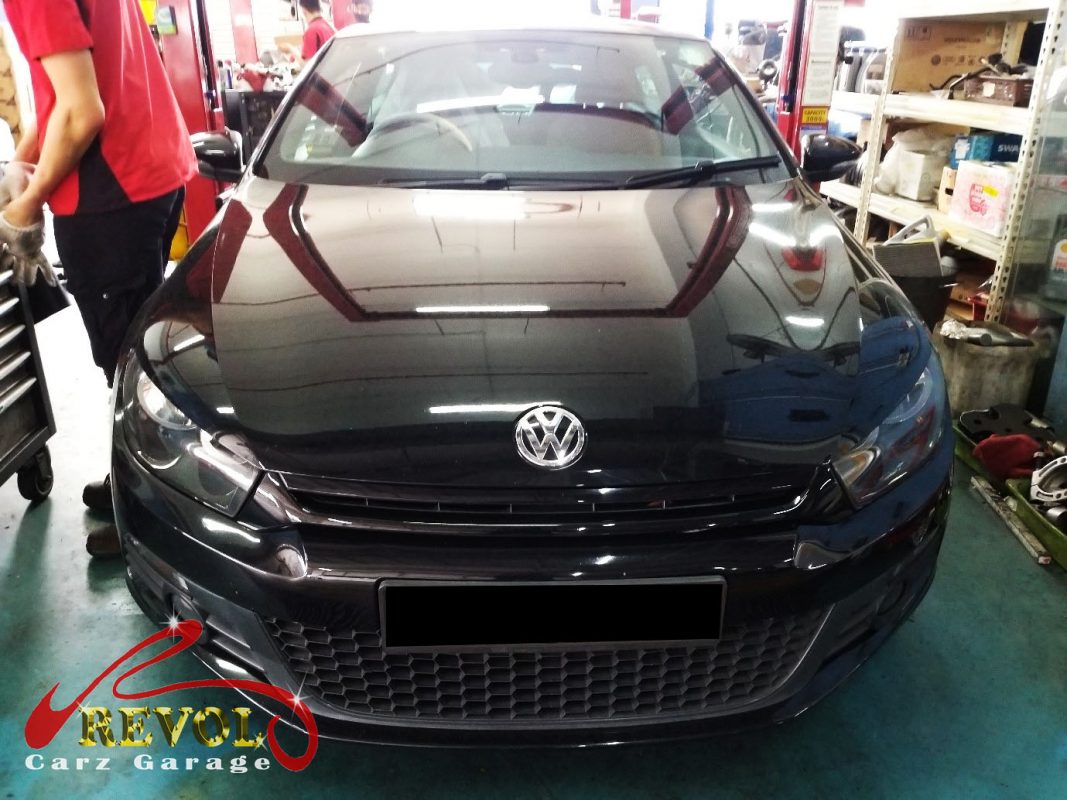 Volkswagen Scirocco parked at the workshop, in for an oil leak diagnosis.