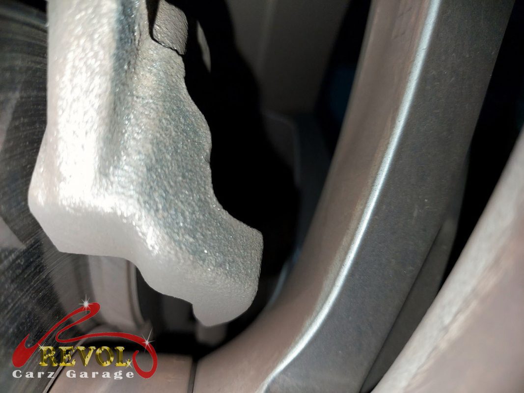The old front discs removed alongside the new set.