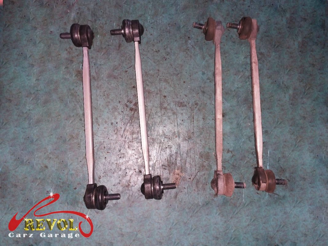 The worn shock absorbers on the Volkswagen Jetta, weeping and weak.