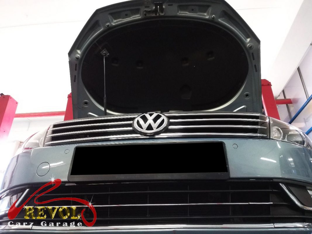 The front suspension checked on the Volkswagen Passat, the knock traced to the drop links.