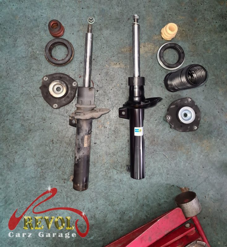 The old worn anti-roll bar drop links removed, ball joints loose.