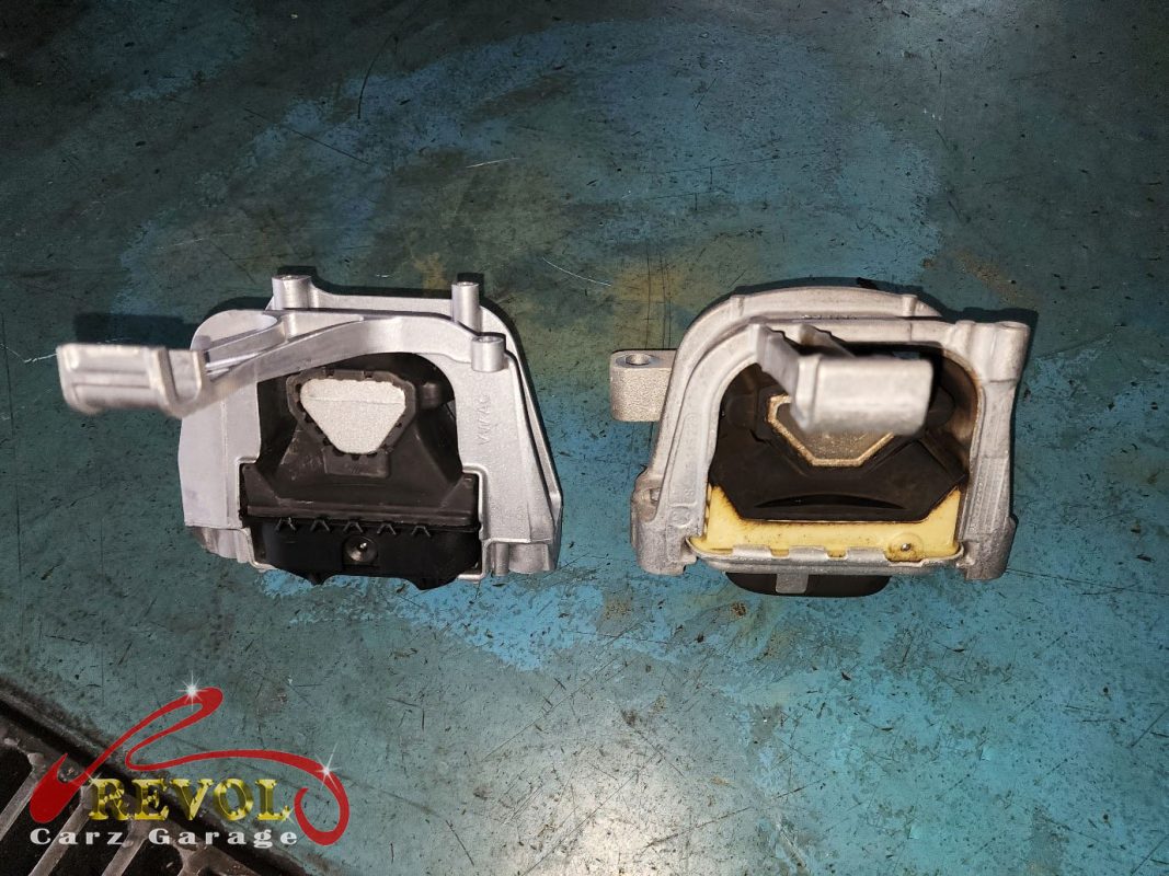 The gearbox mount removed showing the play under load.