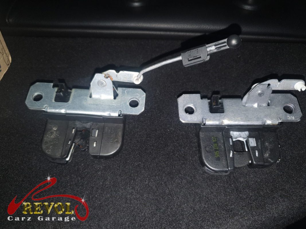 The tailgate trim off the Volkswagen Beetle showing the failed latch mechanism.