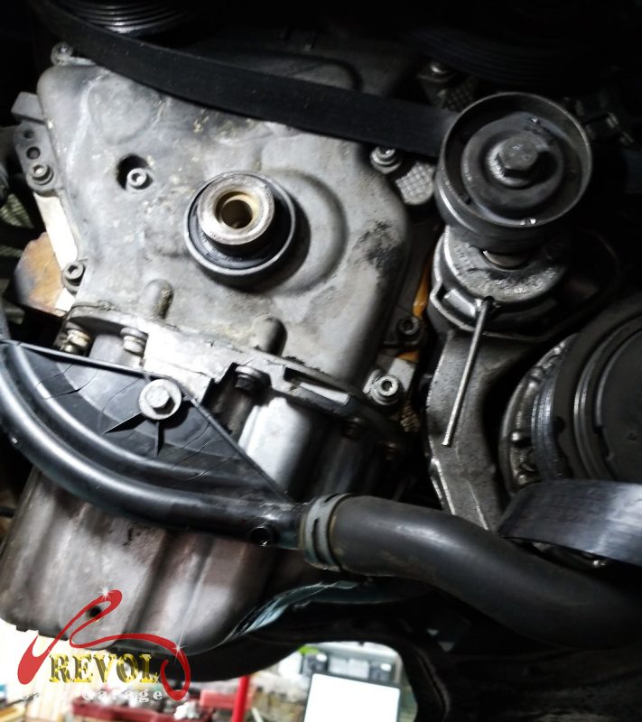 The old hardened crankshaft oil seal levered out.