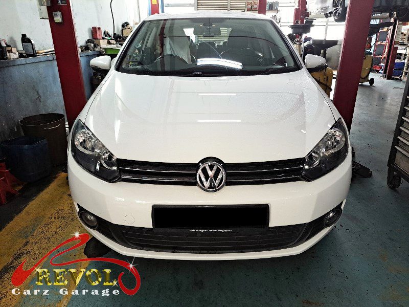 Volkswagen Golf parked at the workshop, in for front suspension inspection.