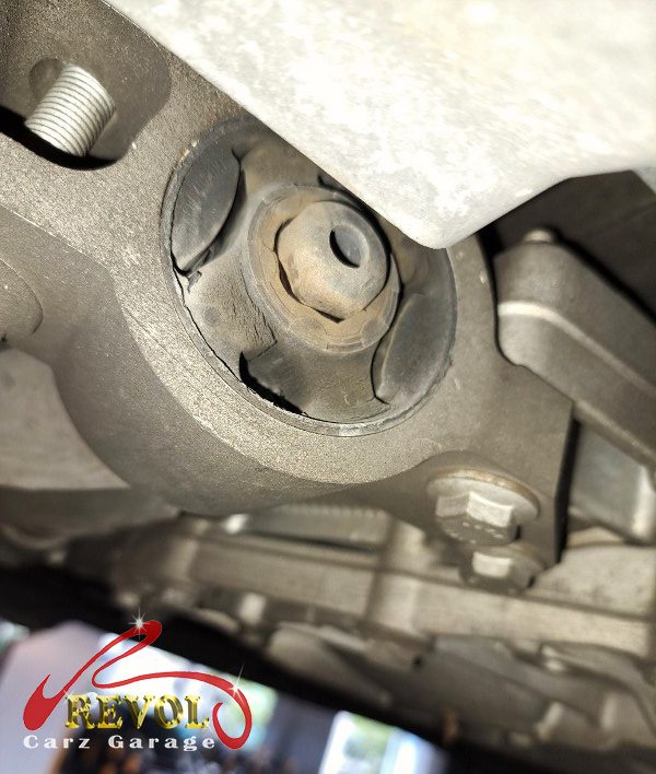 The worn front lower control arm and wheel bearing flagged on the Volkswagen Golf.